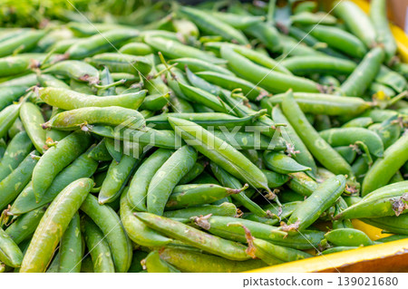 Close up of fresh pea pods sold in the market Close up of fresh pea pods sold in the market 139021680