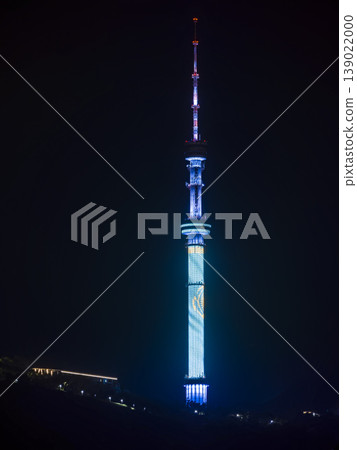 Almaty Tower, KZ, Kazakhstan, illuminated at night 139022000