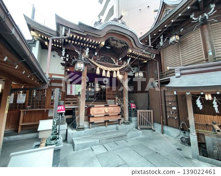 Koami Shrine, a shrine in Nihonbashi, Tokyo, is known for bringing good fortune, strong luck, and protection from evil, as well as wealth. Koami Shrine, a shrine in Nihonbashi, Tokyo, is known for bringing good fortune, strong luck, and protection from evil, as well as wealth. 139022461