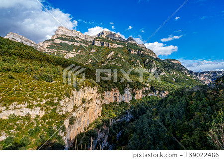 Walking through the Anisclo Canyon in Spain. One of the most spectacular landscapes in Aragon, Pyrenees in Spain Walking through the Anisclo Canyon in Spain. One of the most spectacular landscapes in Aragon, Pyrenees in Spain 139022486