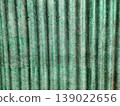 Green Corrugated Fiberglass Texture with Weathered Fibers and Industrial Pattern 139022656