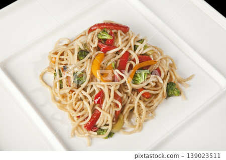 Asian Style Vegetable Noodles Meal. Colorful Noodles with Mixed Vegetables. Asian Style Vegetable Noodles Meal. Colorful Noodles with Mixed Vegetables. 139023511