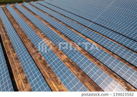 Drone view of rows of solar panels installed on 139023582