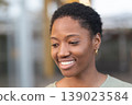 Closeup portrait of smiling woman with short hair 139023584