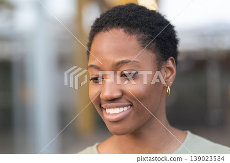 Closeup portrait of smiling woman with short hair 139023584