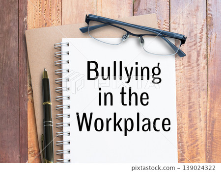 Bullying in the Workplace text on notebook 139024322