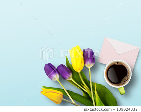 Envelope, tulip flowers and cup of coffee on blue pastel table background Envelope, tulip flowers and cup of coffee on blue pastel table background 139024332