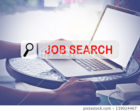 Hand Typing on keyboard with text Job Search. Hand Typing on keyboard with text Job Search. 139024467