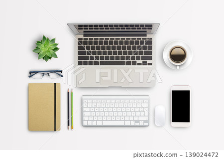 Top view modern workspace with coffee cup and laptop computer,notebook,glasses,smartphone on white table background. 139024472