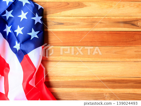 Top view with usa flag on wood table background. Top view with usa flag on wood table background. 139024493
