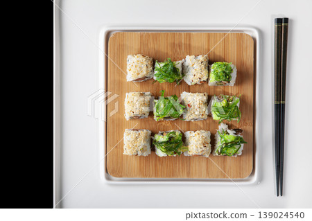 Fresh Sushi Selection Japanese Cuisine. Traditional Japanese Sushi Meal Presentation. Fresh Sushi Selection Japanese Cuisine. Traditional Japanese Sushi Meal Presentation. 139024540