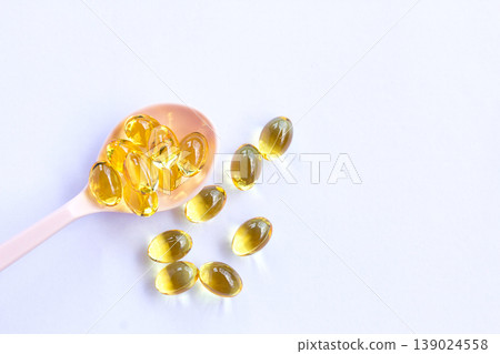 Omega 3 fish liver oil capsules on white background. 139024558