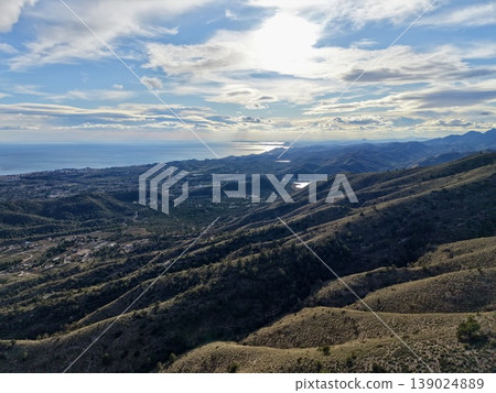 Seaside Landscape Imagery, Scenic Seaside Valley Descending Into Glittering Ocean With Layered Ridges Seaside Landscape Imagery, Scenic Seaside Valley Descending Into Glittering Ocean With Layered Ridges 139024889