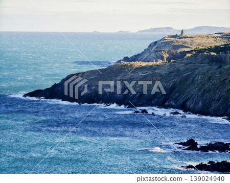 Tranquil Oceanic Landscape At Dusk, Calm Coastal Scene With Distant Promontory And Gentle Waves Tranquil Oceanic Landscape At Dusk, Calm Coastal Scene With Distant Promontory And Gentle Waves 139024940