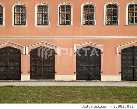 Closeup Of Aged Entrance Details. An Artistic Examination Of Weathered Wood And Wrought Iron Features 139025081
