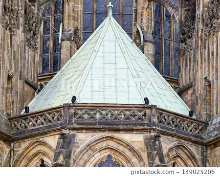 Gothic Style Stone Architectural Feature. Historic Landmark Showcasing Patina And Protective Architecture Gothic Style Stone Architectural Feature. Historic Landmark Showcasing Patina And Protective Architecture 139025206
