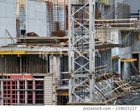 Construction Zone With Steel Framework. Urban Worksite Featuring Scaffolding And Metallic Elements Construction Zone With Steel Framework. Urban Worksite Featuring Scaffolding And Metallic Elements 139025217
