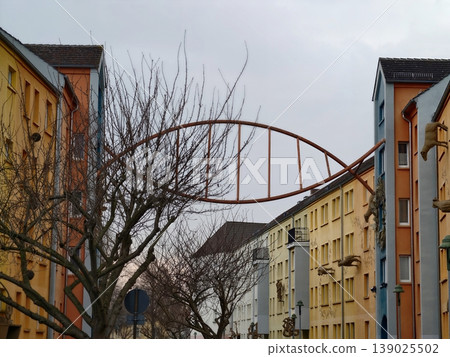 Quiet City Street With Pastel Buildings. Serene Residential Scene With Muted Colors And Soft Light 139025502