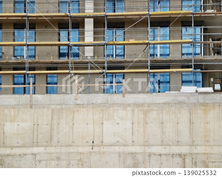 Building Site Elements And Safety Indicators. Structural Groundwork With Raw Textures And Safety Signage 139025532