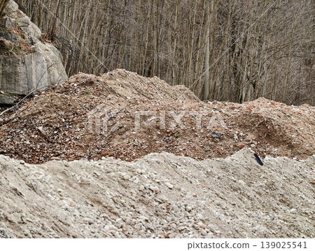 Construction Site Landscape. Abandoned Construction Yard With Spoil Heaps And Natural Surroundings Construction Site Landscape. Abandoned Construction Yard With Spoil Heaps And Natural Surroundings 139025541