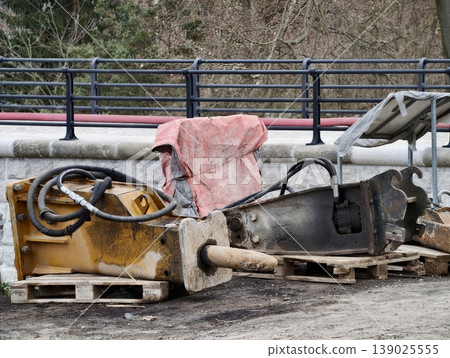 Neglected Construction Area Featuring Corroded Machinery And Discarded Materials Lying About 139025555
