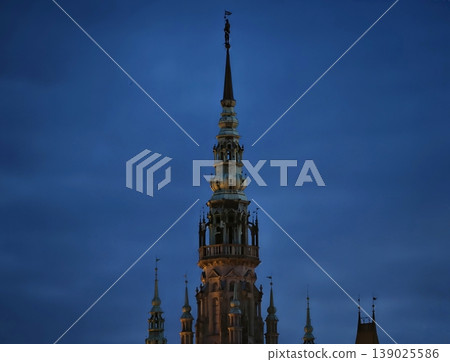 Ancient Church Silhouette. Historical Church With Illuminated Gothic Features Beneath Darkening Sky Ancient Church Silhouette. Historical Church With Illuminated Gothic Features Beneath Darkening Sky 139025586