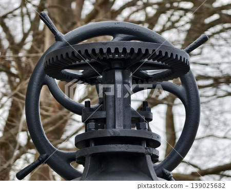 Antiquated Iron Machine Piece Featuring Oxidized Gears And Frosty Winter Environment Background 139025682