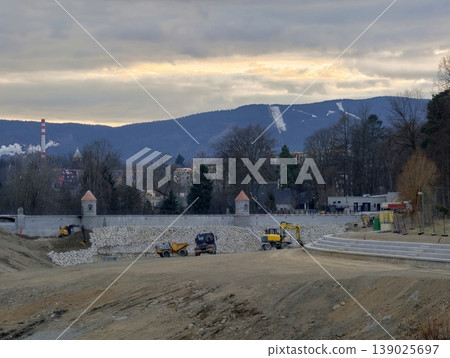 Morning Construction In Rural Area. Sunrise Activity With Earthworks And Temporary Paths Visible Morning Construction In Rural Area. Sunrise Activity With Earthworks And Temporary Paths Visible 139025697