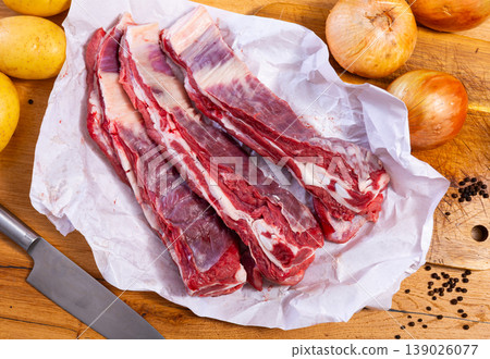 Raw beef brisket served at table 139026077