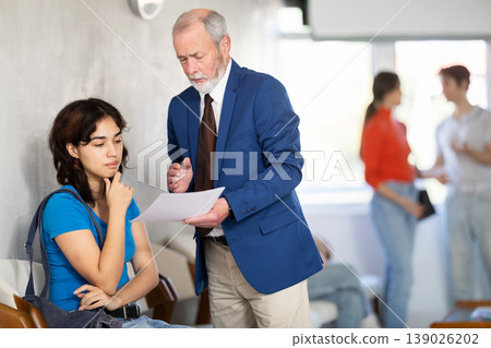 Filipino woman sits in line and communicates with a qualified recruitment manager Filipino woman sits in line and communicates with a qualified recruitment manager 139026202