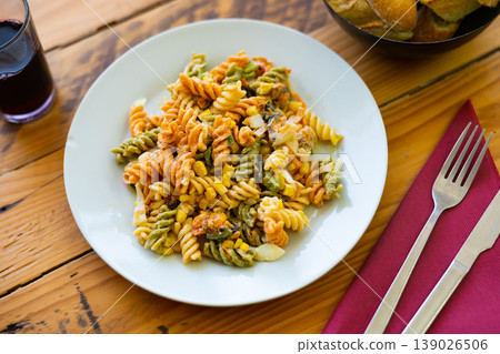 Salad with pasta, seafood, corn and vegetables Salad with pasta, seafood, corn and vegetables 139026506