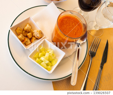 Gazpacho in glass spanish tomato based cold vegetable soup served with cucumbers 139026507