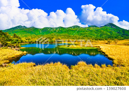 The summer scenery of the World Heritage Shiretoko Five Hus and the Shiretoko mountain range The summer scenery of the World Heritage Shiretoko Five Hus and the Shiretoko mountain range 139027608