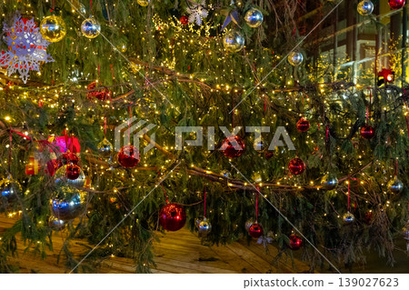 Christmas tree decoration with glowing lights festive ornament holiday background winter celebration Christmas tree decoration with glowing lights festive ornament holiday background winter celebration 139027623