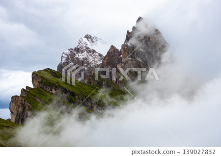 Dramatic Green Mountain Peak Rocky Ridge Covered With Low Cloud Scenic Landscape Dramatic Green Mountain Peak Rocky Ridge Covered With Low Cloud Scenic Landscape 139027832