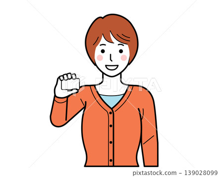 Facing forward. A young woman in a cardigan holding a card. Part 2 Facing forward. A young woman in a cardigan holding a card. Part 2 139028099