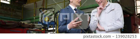 Two people: a factory worker holding a tablet in a manufacturing plant, and a salesman having a meeting with a credit union or other businesspeople. Two people: a factory worker holding a tablet in a manufacturing plant, and a salesman having a meeting with a credit union or other businesspeople. 139028253