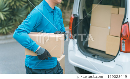 Light cargo driver delivering packages Light cargo driver delivering packages 139028449