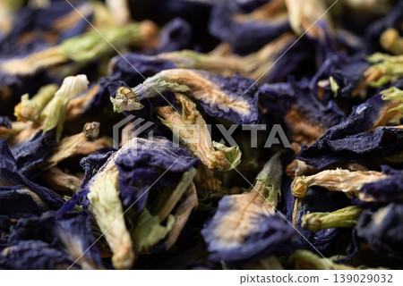 Dried butterfly pea flowers background, natural ingredient for herbal blue tea and food coloring Dried butterfly pea flowers background, natural ingredient for herbal blue tea and food coloring 139029032