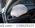 Deployed Passenger Airbag Inside Car Interior After Collision 139029325