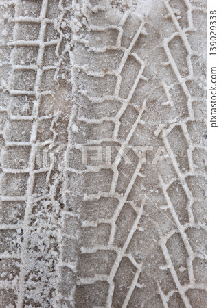 Snow Tire Track Pattern on Icy Ground Winter Texture Background Snow Tire Track Pattern on Icy Ground Winter Texture Background 139029338
