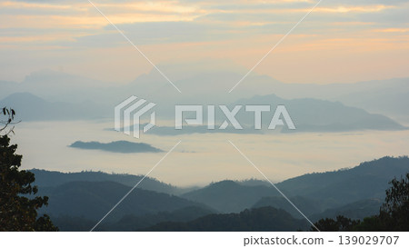sunrise with moving of cloud and clear sky and layer of mountain sunrise with moving of cloud and clear sky and layer of mountain 139029707