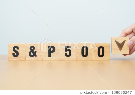 Hand change wooden block of SP500 text to UP and Down arrow symbol icon. stock market index, trade, trade company in the United States, financial growth and Cut loss concept Hand change wooden block of SP500 text to UP and Down arrow symbol icon. stock market index, trade, trade company in the United States, financial growth and Cut loss concept 139030247