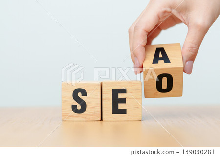 Hand change Wooden block from SEA to SEO. Search Engine Optimization, SEM, Advertising, Marketing, Idea, Strategy, Keyword, Content and technology concept 139030281