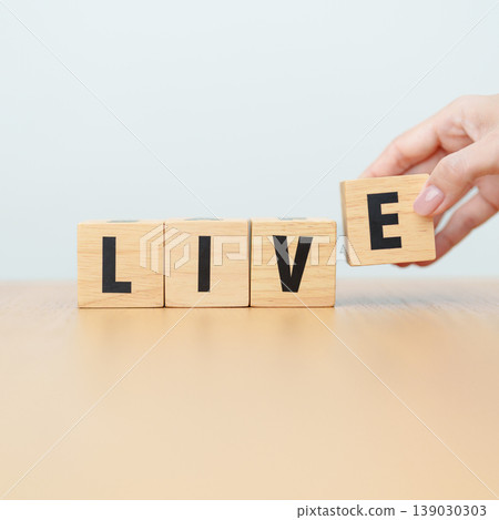 hand change wooden block Live to Life. Lifestyle, Live your life, learning, motivation and mindset concepts hand change wooden block Live to Life. Lifestyle, Live your life, learning, motivation and mindset concepts 139030303