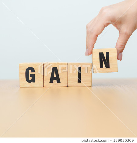 wooden block Gain. solution and Value, Mindset for growth business, No Pain No Gain, Work hard, Motivation, Fitness, health, wellness and challenge concepts 139030309