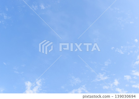 beautiful blue sky and white fluffy group of clouds with sunrise in the morning, natural background beautiful blue sky and white fluffy group of clouds with sunrise in the morning, natural background 139030694