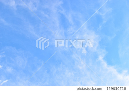 beautiful blue sky and white fluffy group of clouds with sunrise in the morning, natural background beautiful blue sky and white fluffy group of clouds with sunrise in the morning, natural background 139030716