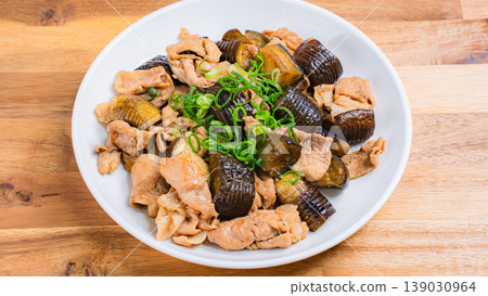 Stir-fried pork and eggplant for a hearty, garlicky meal. Stir-fried pork and eggplant for a hearty, garlicky meal. 139030964