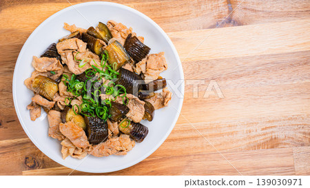 Stir-fried pork and eggplant for a hearty, garlicky meal. Stir-fried pork and eggplant for a hearty, garlicky meal. 139030971